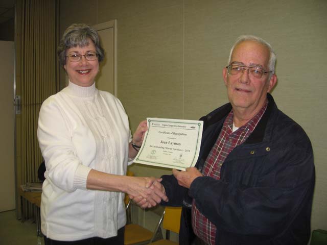 Pictured are Joani Layman and Bill McCaleb, Master Gardener Coordinator.